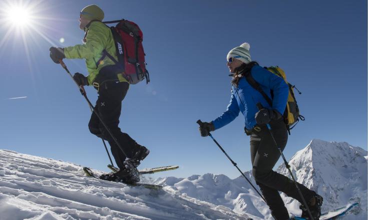 Two people on a snowshoe hike